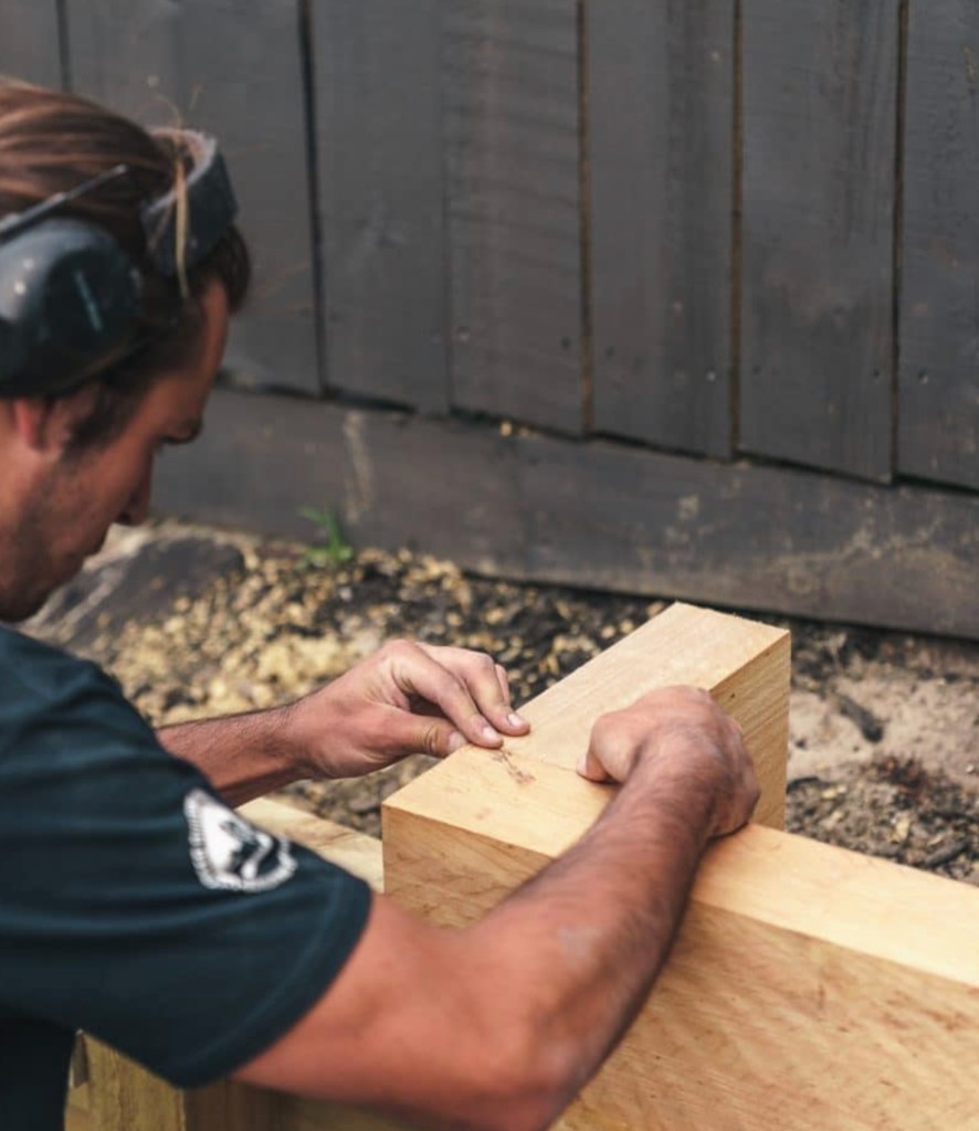 Builder marking timber onsite